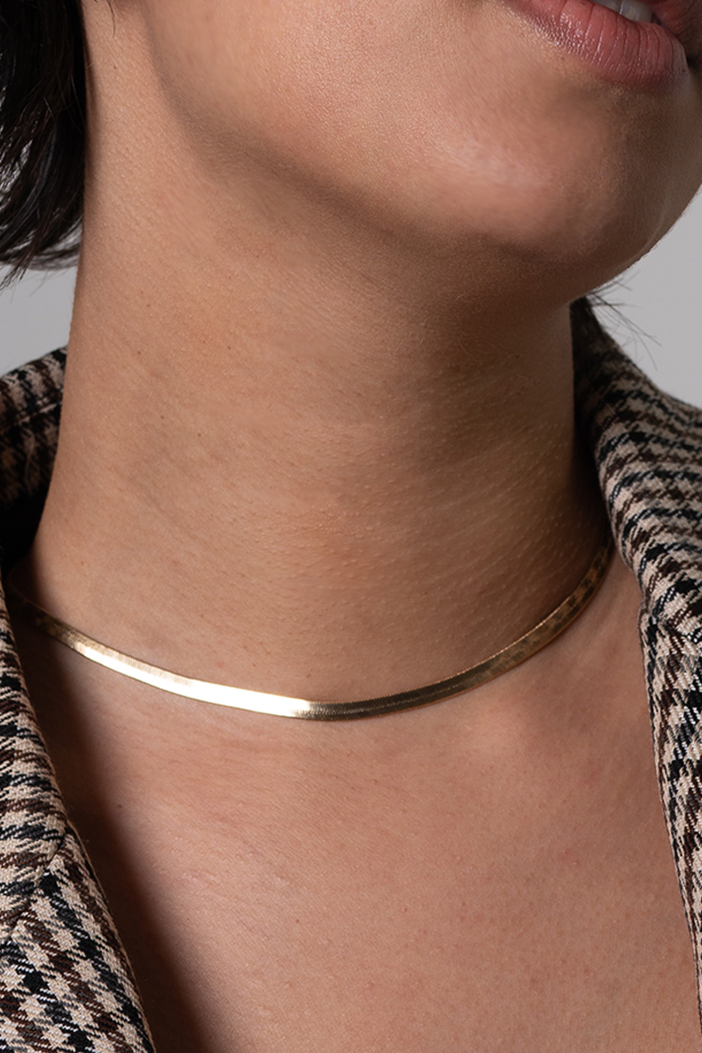 With a snake style of a thick layer chain, this 18k Gold Filled necklace is going strong. A staple piece that everyone should have in their jewelry collection. Wear this versatile chain to instantly transform your look with this iconic accessory.