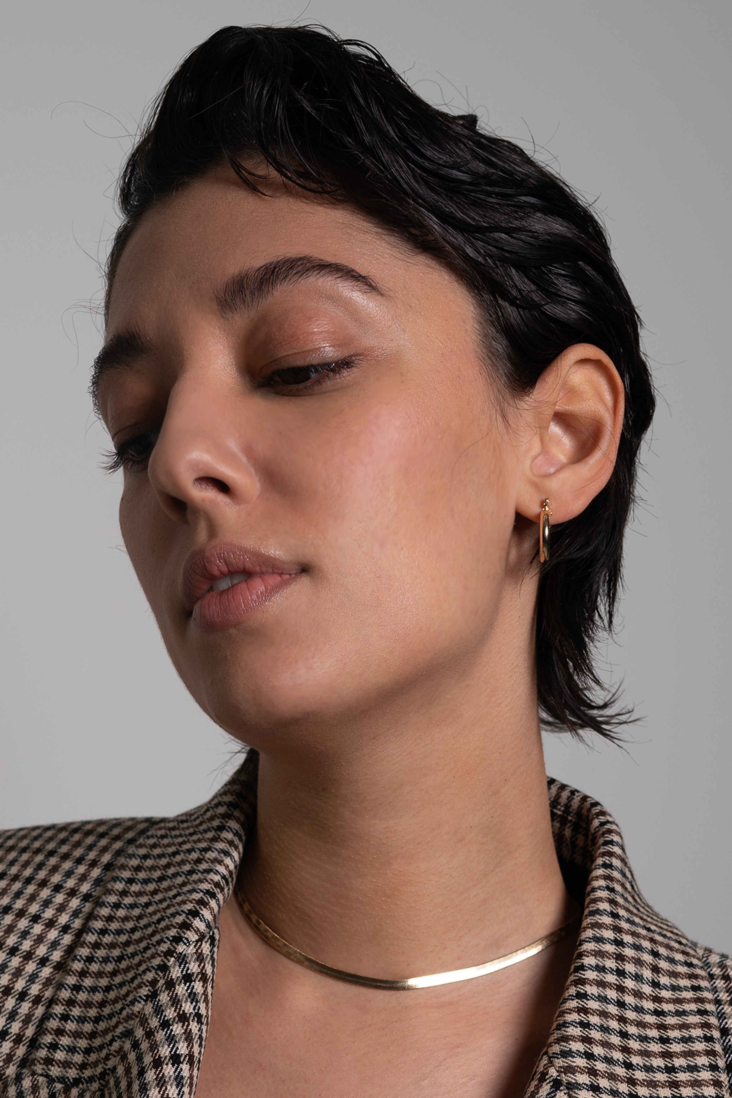 With a snake style of a thick layer chain, this 18k Gold Filled necklace is going strong. A staple piece that everyone should have in their jewelry collection. Wear this versatile chain to instantly transform your look with this iconic accessory.