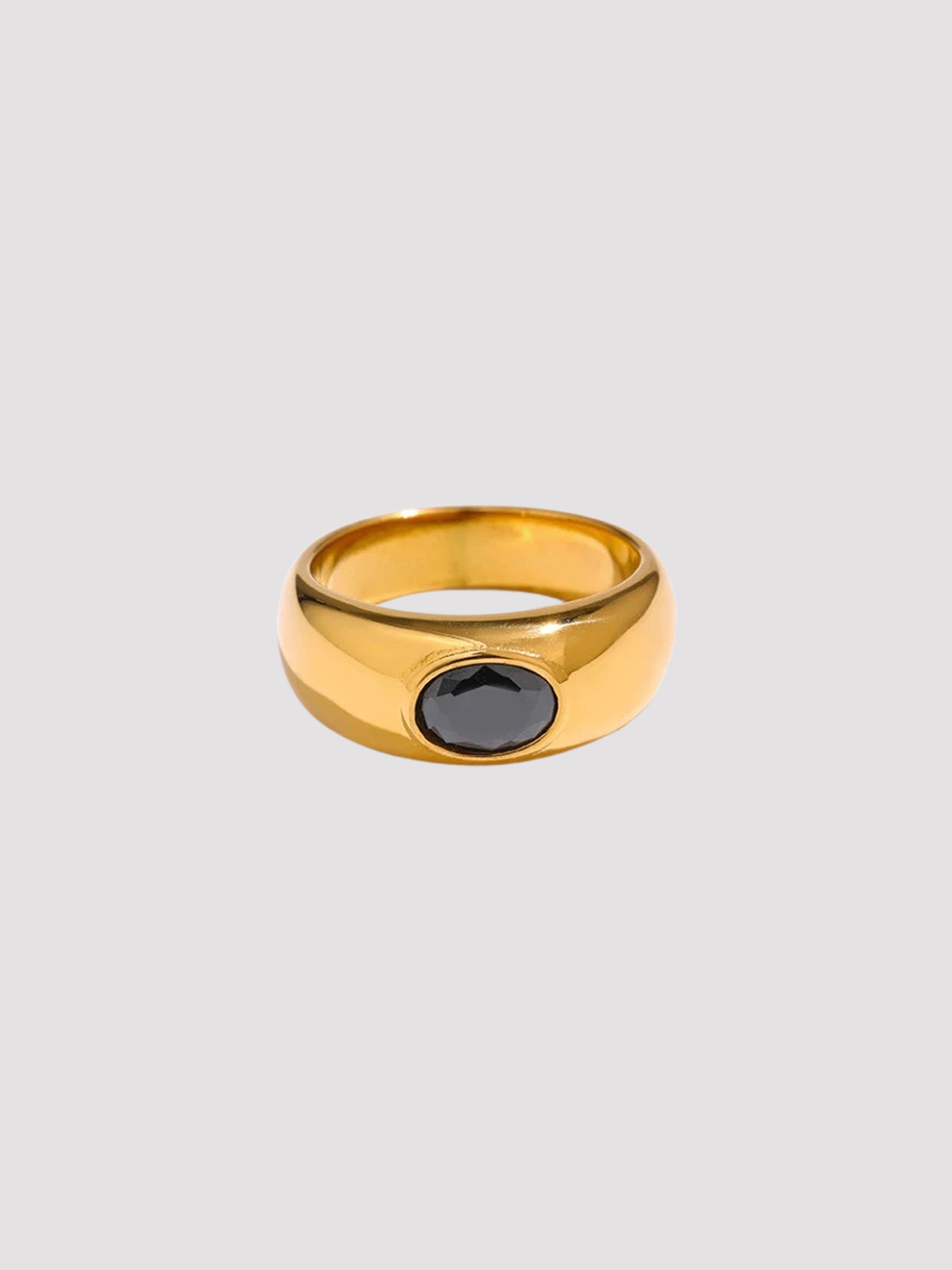 The perfect stainless steel ring accessory to impress those around you while running errands or on a date night. A delicate oval black stone centerpiece. A vintage and unisex design meant to be worn by all. Details: 18K Gold Plated in Stainless Steel Made in Stainless Steel Black Gemstone Available in US ring sizes 6, 7, and 8. Weight about 7 g Surface Width 4.5 mm