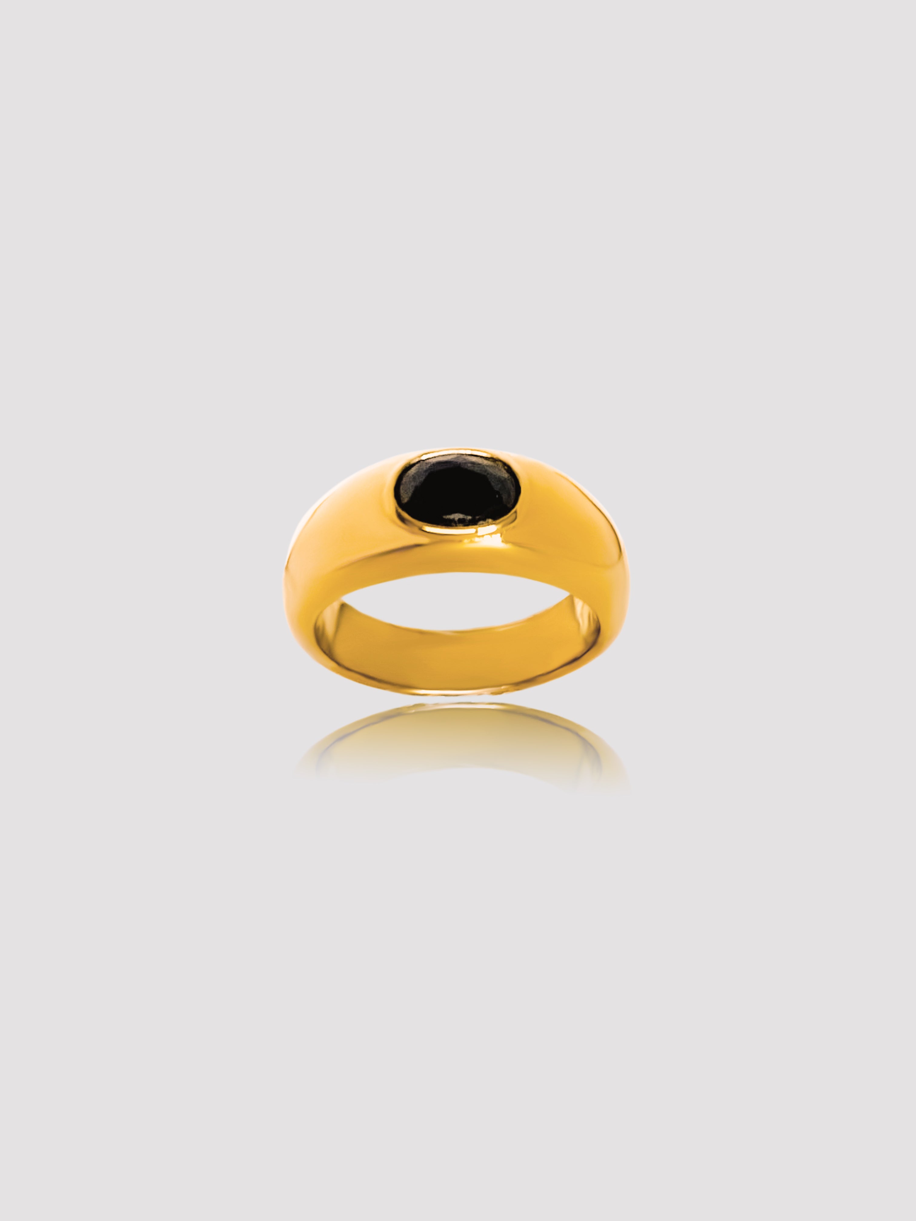 The perfect stainless steel ring accessory to impress those around you while running errands or on a date night. A delicate oval black stone centerpiece. A vintage and unisex design meant to be worn by all. Details: 18K Gold Plated in Stainless Steel Made in Stainless Steel Black Gemstone Available in US ring sizes 6, 7, and 8. Weight about 7 g Surface Width 4.5 mm