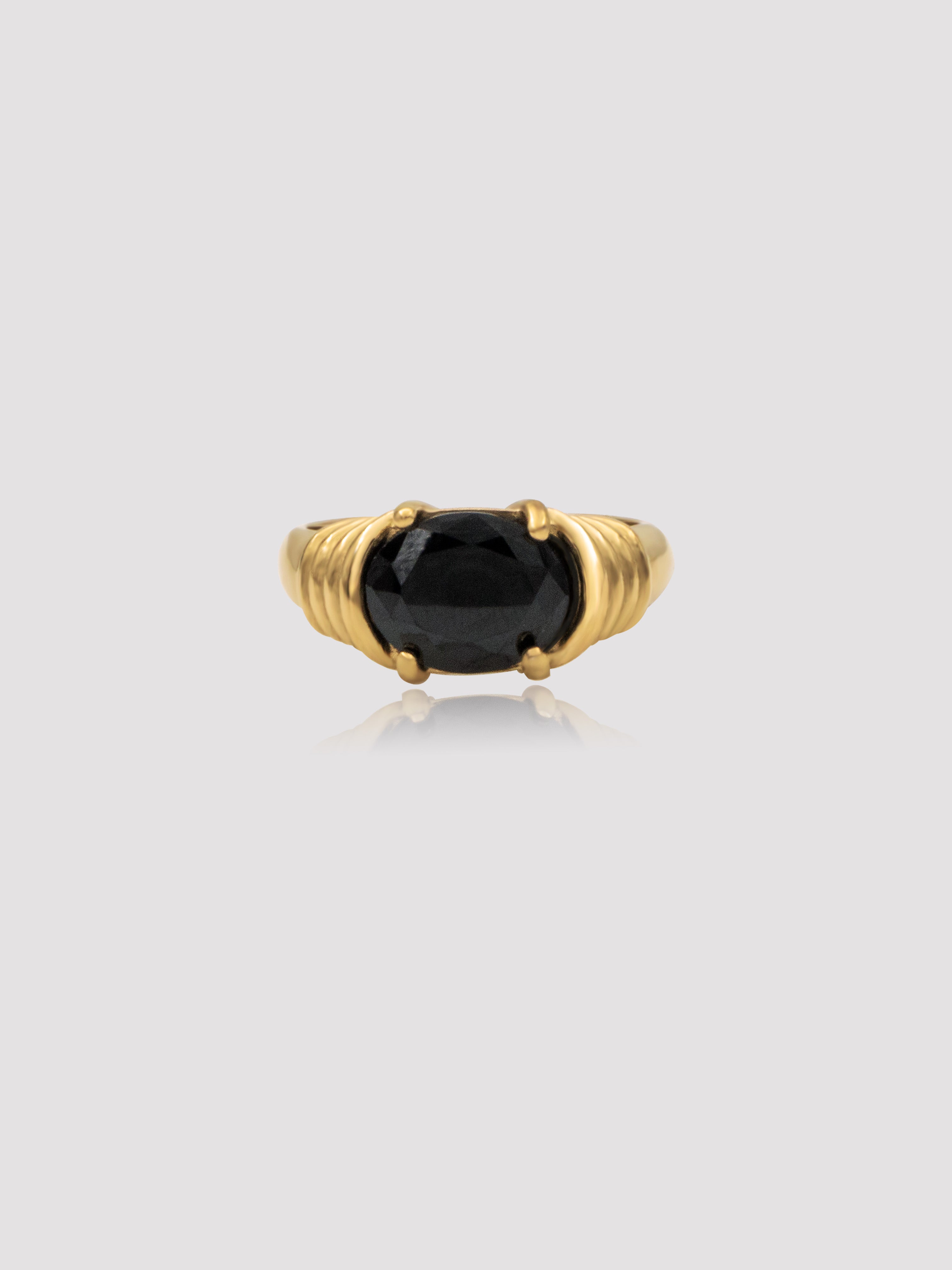 Vintage yet simple - Crafted to draw attention to yourself. The Crosby Stone Ring is the true embodiment of an heirloom, in color, in design, and an attitude. A timeless and of the moment ring piece in your jewelry collection for years to come. Details: 18K Gold Plated on Stainless Steel Made in Stainless Steel Available in colors: Black, Red, Green Available in US ring sizes: 6, 7, 8. Dimensions: Surface width mm Weight about g