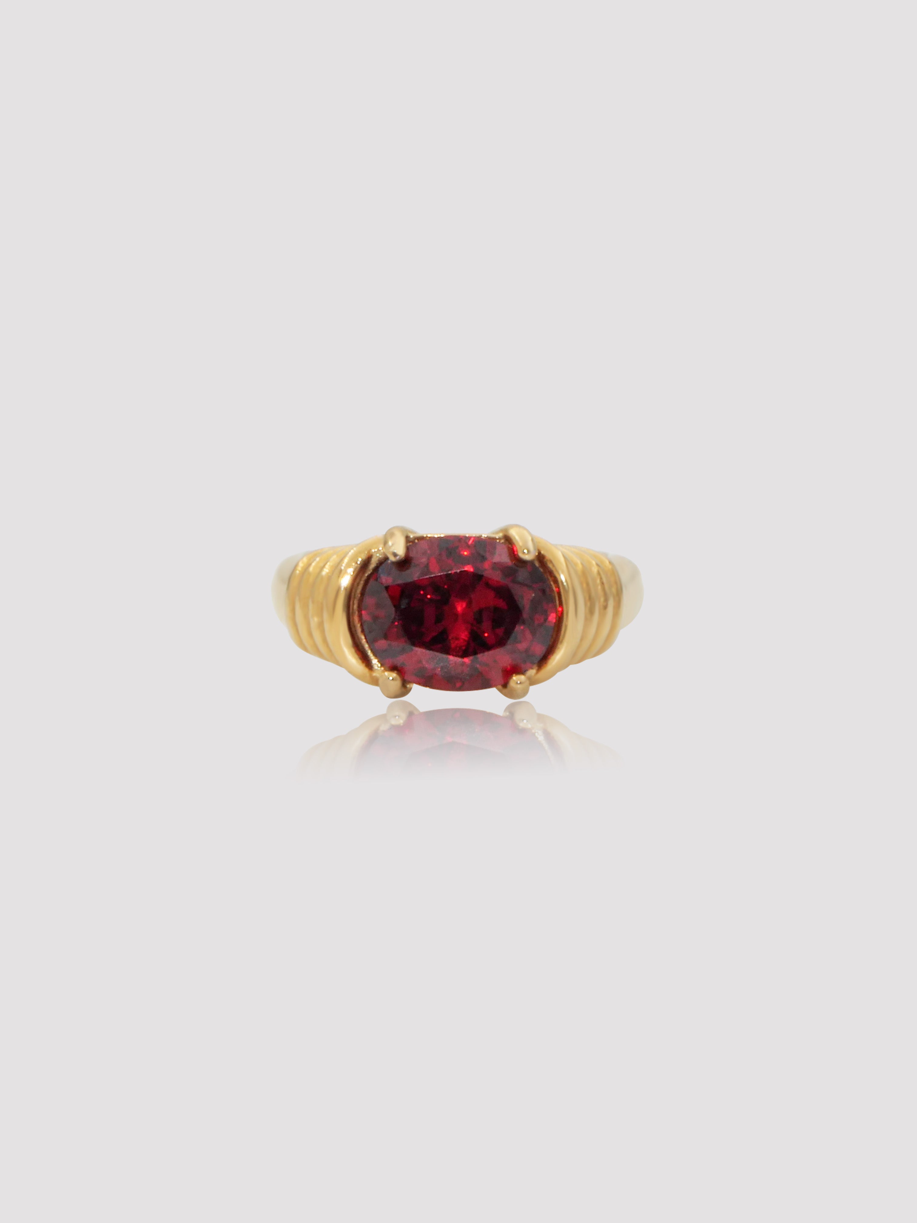 Vintage yet simple - Crafted to draw attention to yourself. The Crosby Stone Ring is the true embodiment of an heirloom, in color, in design, and an attitude. A timeless and of the moment ring piece in your jewelry collection for years to come. Details: 18K Gold Plated on Stainless Steel Made in Stainless Steel Available in colors: Black, Red, Green Available in US ring sizes: 6, 7, 8. Dimensions: Surface width mm Weight about g