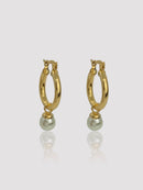 Add a sense of charm and beauty to your look when you wear the Bedford 18K Gold Filled hoops. The freshwater pearl along with the luscious gold texture will create such a unique design. Each pearl is sightly different in color and shape due to its natural origin.  Details:  18K Gold Filled  Freshwater Pearl  About 3g/pair  Hypoallergenic