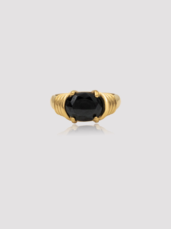 Vintage yet simple - Crafted to draw attention to yourself. The Crosby Stone Ring is the true embodiment of an heirloom, in color, in design, and an attitude. A timeless and of the moment ring piece in your jewelry collection for years to come.  Details:  18K Gold Plated on Stainless Steel  Made in Stainless Steel  Available in colors: Black, Red, Green  Available in US ring sizes: 6, 7, 8.  Dimensions: Surface width mm  Weight about g