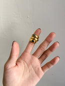 The perfect stainless steel ring accessory to impress those around you while running errands or on a date night. A delicate oval black stone centerpiece. A vintage and unisex design meant to be worn by all.    Details:  18K Gold Plated in Stainless Steel  Made in Stainless Steel  Black Gemstone  Available in US ring sizes 6, 7, and 8.  Weight about 7 g  Surface Width 4.5 mm