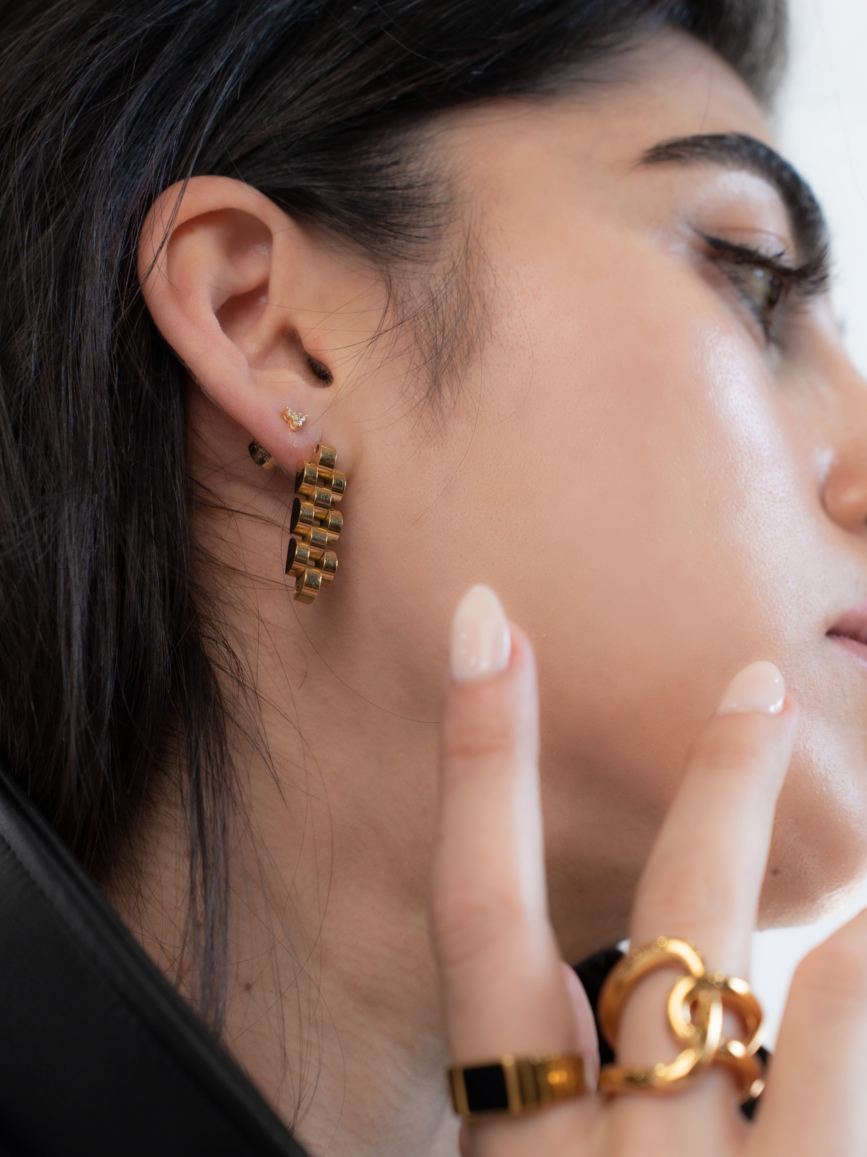 Rolex watchband chain style earrings from trendy and popular minimalist jewelry brand miramira New York r